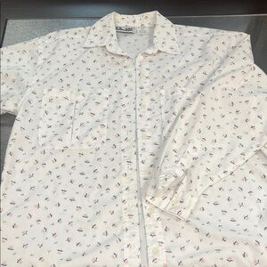Women's White Floral Button Down Shirt Row one. Gives a western vibe